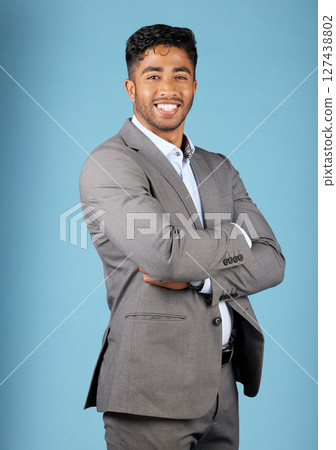 Businessman, happy portrait and pride in suit with arms crossed, motivation and vision for success in mockup studio background. Indian male, corporate worker and entrepreneur confident, smile or goal Businessman, happy portrait and pride in suit with arms crossed, motivation and vision for success in mockup studio background. Indian male, corporate worker and entrepreneur confident, smile or goal 127438802