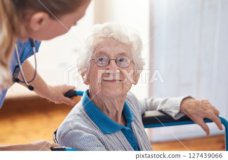 Disability, nursing and senior woman with a doctor for care, consultation and medical help at a hospital. Healthcare, communication and elderly patient in a wheelchair with a nurse in a home Disability, nursing and senior woman with a doctor for care, consultation and medical help at a hospital. Healthcare, communication and elderly patient in a wheelchair with a nurse in a home 127439066
