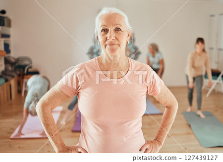 Portrait, elderly woman and yoga class with coach for wellness, exercise and health, workout and relax in a studio. Proud, yoga coach and senior lady leader with group for meditation, training and ze Portrait, elderly woman and yoga class with coach for wellness, exercise and health, workout and relax in a studio. Proud, yoga coach and senior lady leader with group for meditation, training and ze 127439127