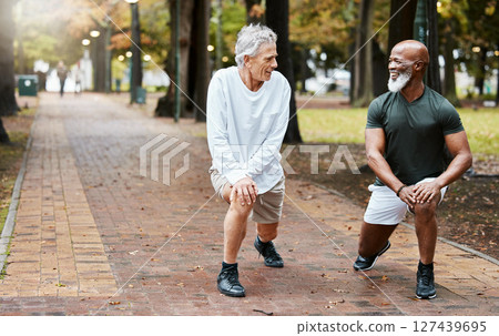 Fitness, friends and exercise with senior men stretching for a warm up at an outdoor park for health and wellness during retirement. Old man and cardio partner together for a workout while talking 127439695