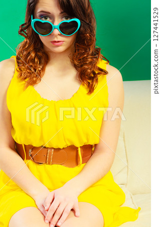 Girl in green sunglasses portrait Girl in green sunglasses portrait 127441529