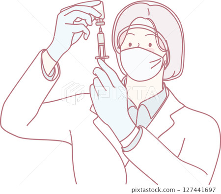 A healthcare professional prepares a vaccine for the community health initiative against COVID19 A healthcare professional prepares a vaccine for the community health initiative against COVID19 127441697