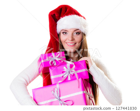 Woman santa helper hat with many pink gift boxes 127441830
