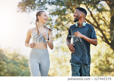 Couple, training and outdoor for running for health, wellness and workout together. Man, woman and fitness in nature, for exercise and smile to relax, practice and workout for bonding and loving. Couple, training and outdoor for running for health, wellness and workout together. Man, woman and fitness in nature, for exercise and smile to relax, practice and workout for bonding and loving. 127442578