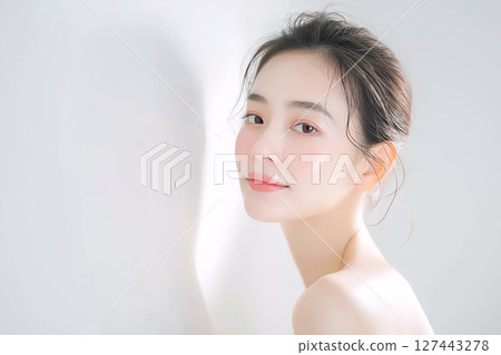 "AI-generated image" of a beautiful woman with clear skin 127443278