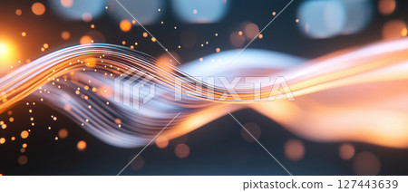 Abstract image of flowing digital lines with glowing particles, representing technology and innovation 127443639