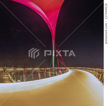 Tolerance Bridge pedestrian view at night in Dubai 127444018