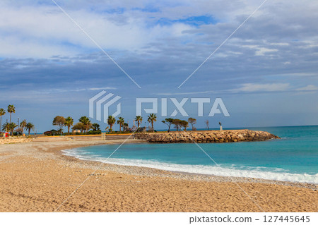 Beach of Mediterranean sea in Menton, French Riviera, France 127445645