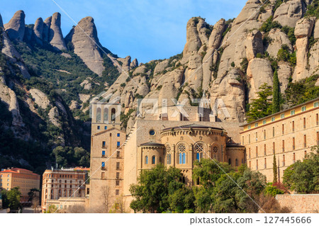View of the famous Santa Maria de Montserrat Abbey located on the mountain of Montserrat nearby from Barcelona in Catalonia, Spain. Montserrat Monastery View of the famous Santa Maria de Montserrat Abbey located on the mountain of Montserrat nearby from Barcelona in Catalonia, Spain. Montserrat Monastery 127445666