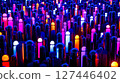 A large group of colorful lights in a dark room 127446402