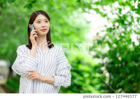 Woman with smartphone Woman with smartphone 127446577