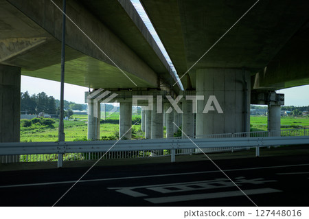 Light and shadow under the highway overpass Light and shadow under the highway overpass 127448016