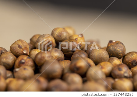 fried but not boiled chickpeas are on the table with a tablecloth, closeup fried but not boiled chickpeas are on the table with a tablecloth, closeup 127448285