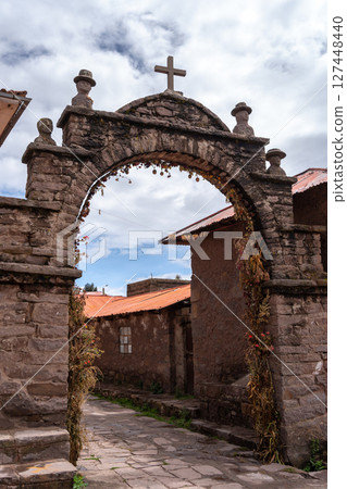 Catholic arch in a village on Taquile Island, Lake Titicaca, Peru 127448440