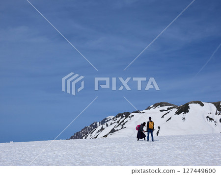 Tourists climbing at Murodo on the tourist attraction Tateyama Kurobe Alpine Route 127449600