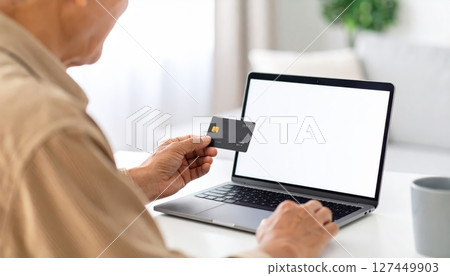 AI image: Seniors shopping online with a credit card AI image: Seniors shopping online with a credit card 127449903