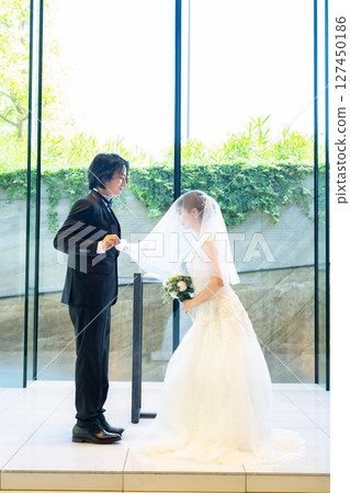 Wedding Ceremony Veil Up 127450186