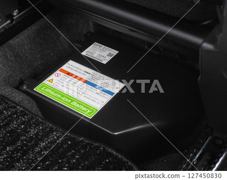 Lithium-ion battery installed in the interior of a car Lithium-ion battery installed in the interior of a car 127450830