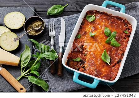 Eggplant Parmigiana in a baking dish, top view 127451048