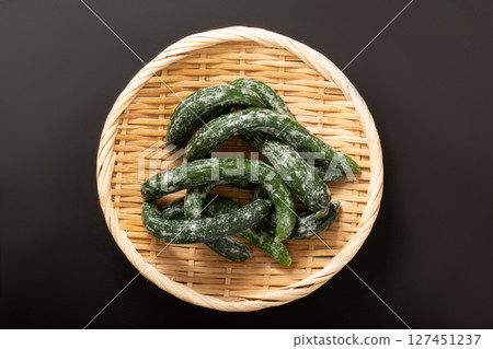 Mini cucumbers pickled in mustard Mini cucumbers pickled in mustard 127451237