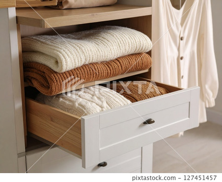 Closet hanging in the room Closet hanging in the room 127451457