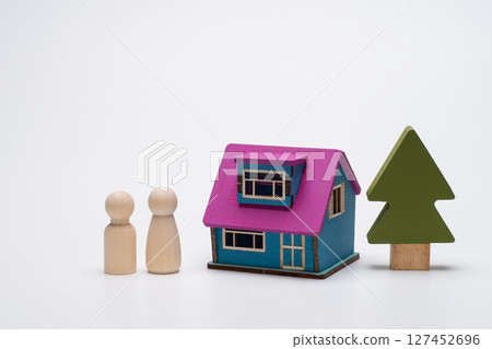 Image of a couple and their home Image of a couple and their home 127452696