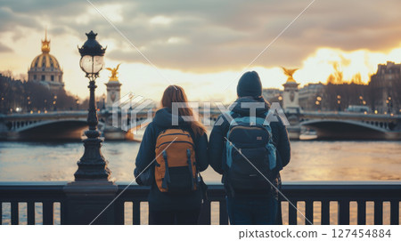 woman river sunset sky hues backpack 127454884