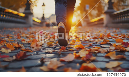 person cobblestone path sunset persons legs 127454970