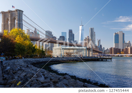 Iconic view of Brooklyn Bridge with Manhattan skyscrapers 127455444