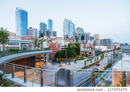 Seattle skyline during sunset with vibrant sky colors and city lights Seattle skyline during sunset with vibrant sky colors and city lights 127455479