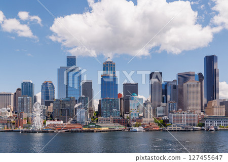 Bright and sunny panoramic view of Seattle skyline from the water Bright and sunny panoramic view of Seattle skyline from the water 127455647
