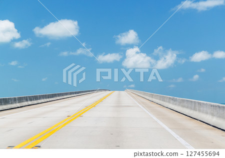 Highway stretching into the sky 127455694