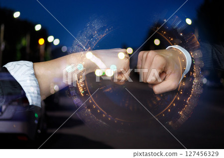 Business collaboration moment at night. 127456329