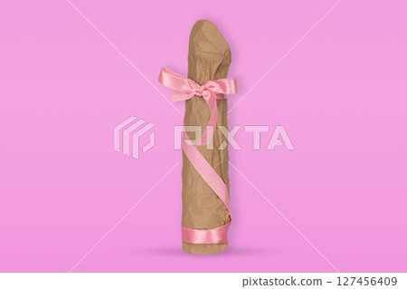 Vibrator Wrapped in Craft Paper with Pink Ribbon 127456409