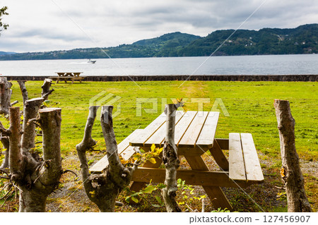 Camp site with picnic table in norwegian nature Camp site with picnic table in norwegian nature 127456907
