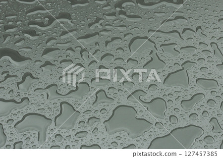 Water drops on the surface 127457385