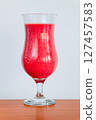 Glass of tasty strawberry smoothie with yoghurt. 127457583