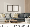 Two blank frames in lounge interior with blue sofa and table with wooden panel on the wall, 3d render 127458554