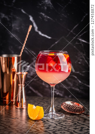 Glass of red wine spanish cocktail 127458872