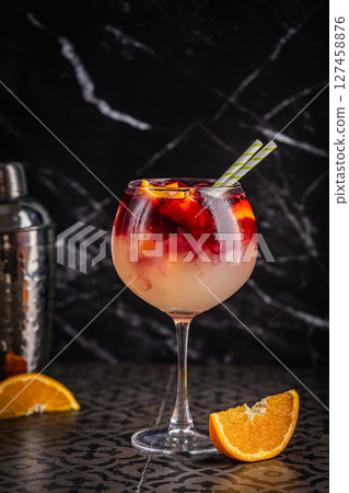 Glass of red wine spanish cocktail 127458876