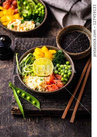 Healthy bowl with salmon and vegetables Healthy bowl with salmon and vegetables 127459133