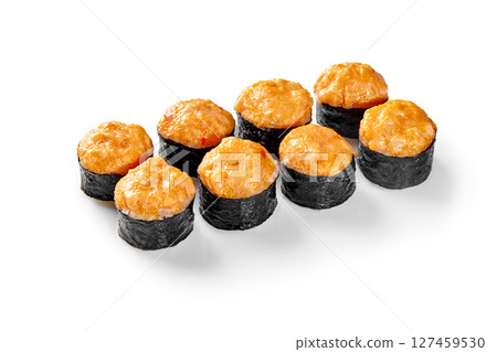 Baked sushi rolls with spicy sauce topping arranged on white background 127459530