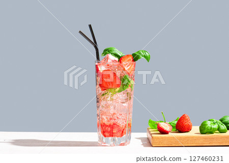 Strawberry and basil Mojito cocktail drink 127460231
