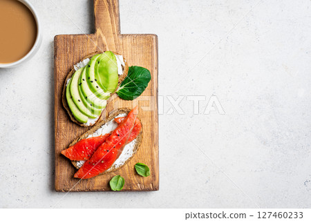 Avocado and salmon breakfast toast 127460233
