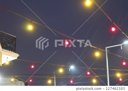 Colored lanterns light at night. Colored lanterns light at night. 127462383