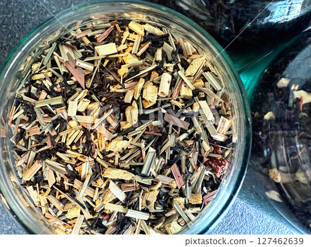Assortment of herbal tea in glass jars 127462639