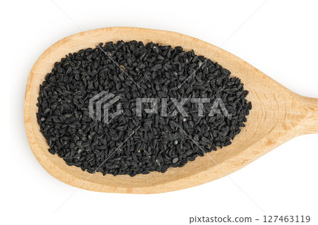 Nigella sativa or Black cumin in wooden spoon isolated on white background. Top view. Flat lay. 127463119