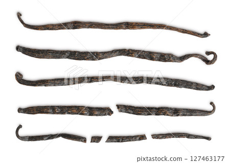 Dried vanilla stick isolated on white background. Top view. Flat lay. Dried vanilla stick isolated on white background. Top view. Flat lay. 127463177
