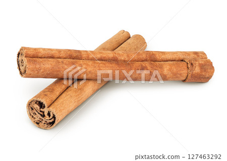 Cinnamon sticks isolated on white background with full depth of field 127463292