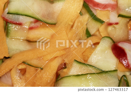 Close up of pickled shredded fried vegetables Close up of pickled shredded fried vegetables 127463317
